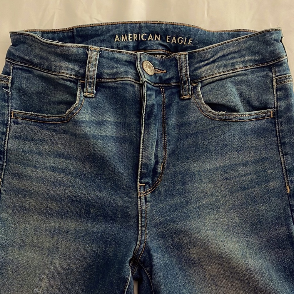 American Eagle girls jeans. Lighter blue a little faded.